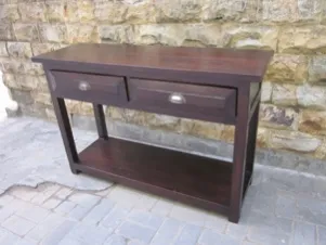 Dark console with shelf