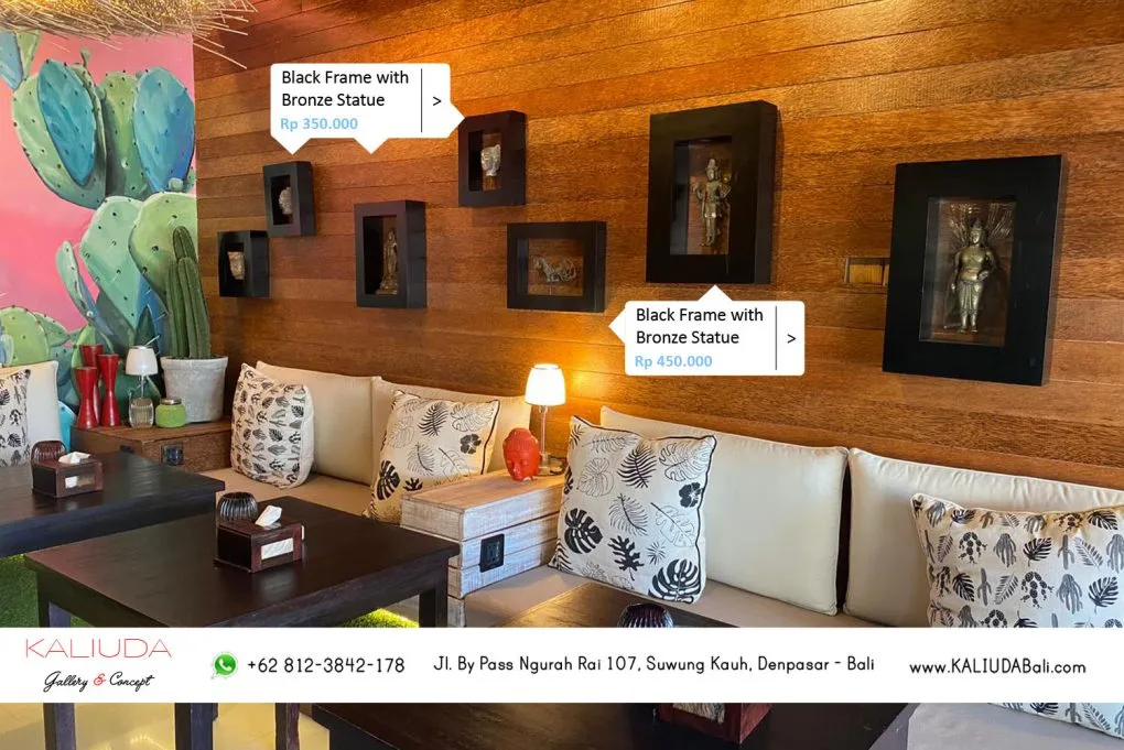 Black frame with bronze statue at Resto & Bar, Sanur by Kaliuda Gallery Bali
